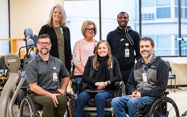 Peer support staff, from left: Pete Anziano, Mariellen Jacobs, Kim Ross, Karen DeVault, Daquarius Greene and David Carter at the Shepherd Center