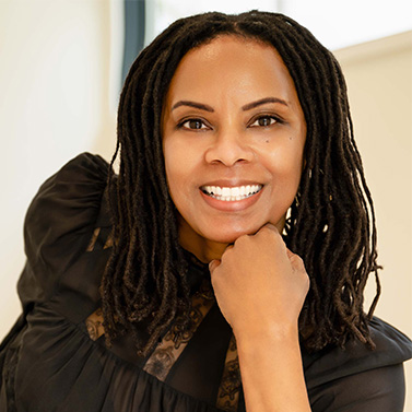 Headshot of Greta Holness